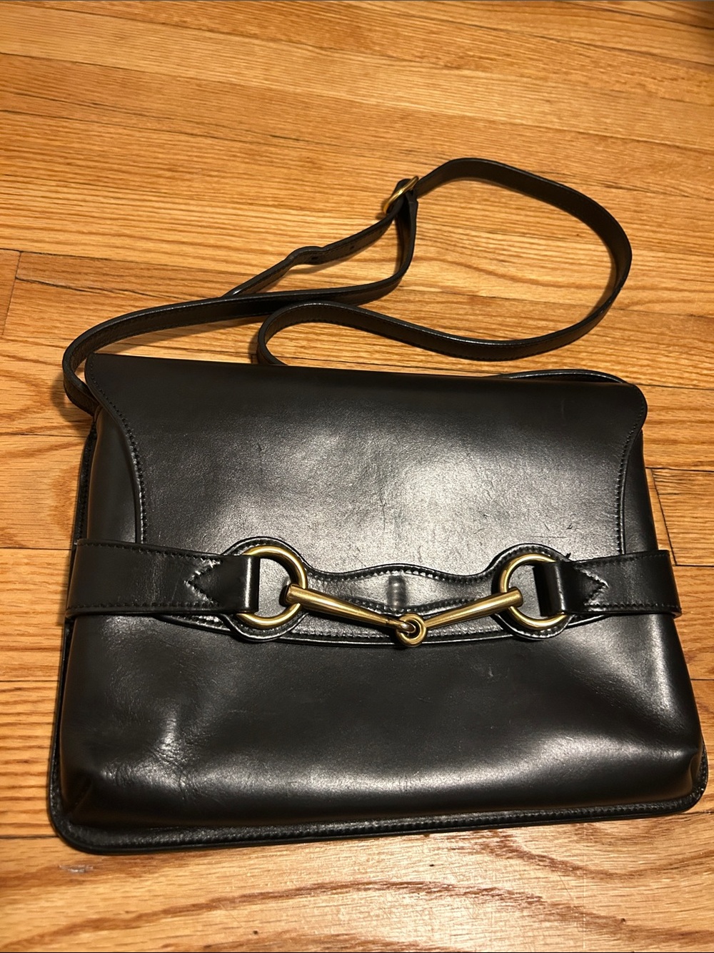 Gucci Black Leather Bag with Gold Accents